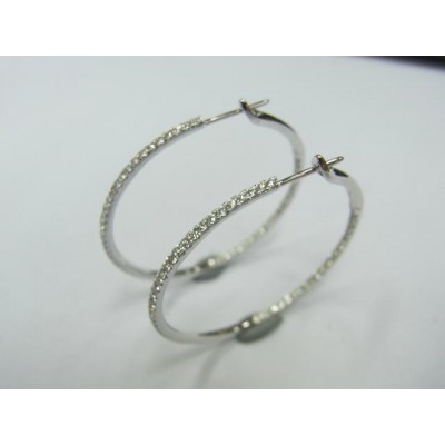 Pair of 18 karat white gold diamond hoops.
