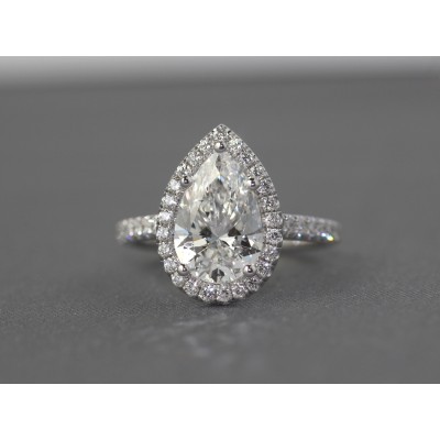 Pear shape diamond halo ring.